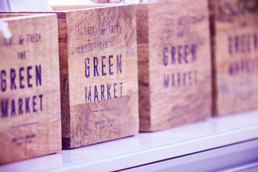 lose-up of vintage wooden boxes with green market text, ideal for commerce themes.